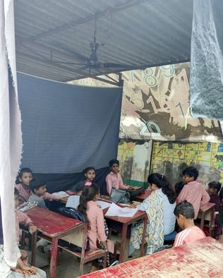The roof of the school is leaking, students are studying in tin shed