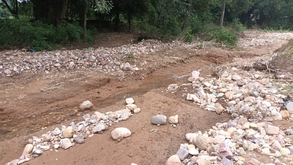 Flooding of drain in Tikri made fertile land barren