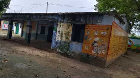 Classes are being held under tin sheds, water drips from the roofs of schools