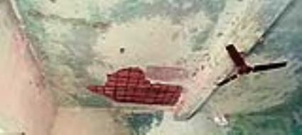 The boundary of some school is destroyed and somewhere iron rods are visible