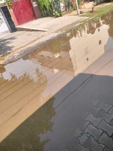 Dirty water filled in the streets of Defense Colony