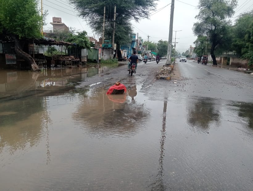 Water filled in the streets, potholes on the roads