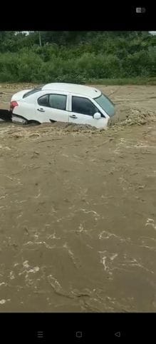 Father and son trapped with car in a swollen ravine in Gagret, villagers saved their lives