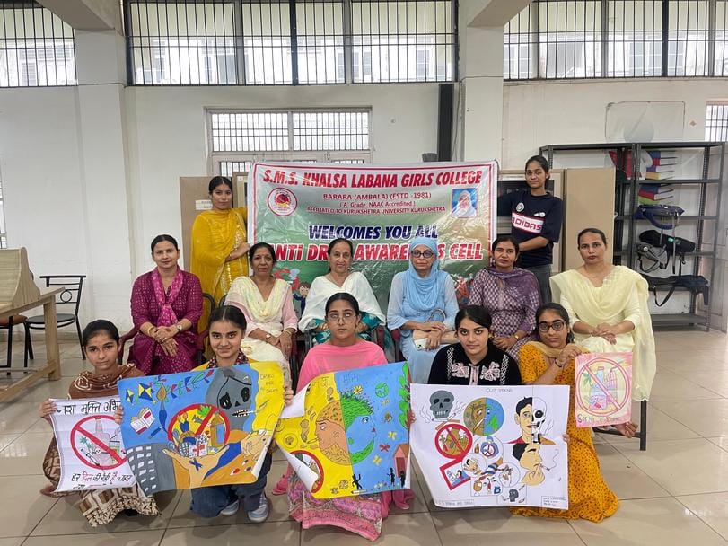 Diksha first in slogan and Payal first in poster competition