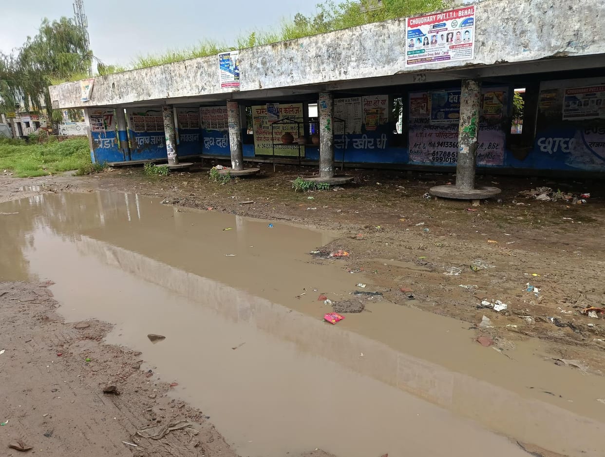 A dilapidated bus station... no place for passengers, no place for facilities