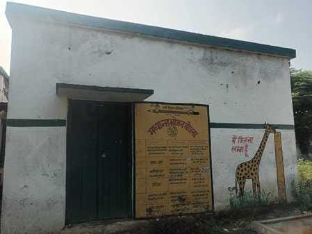 What kind of a school is this: cracks peeking out from the walls, plaster falling off, children living in the shadow of fear