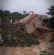 A concrete house fell into the river in Damodarpur