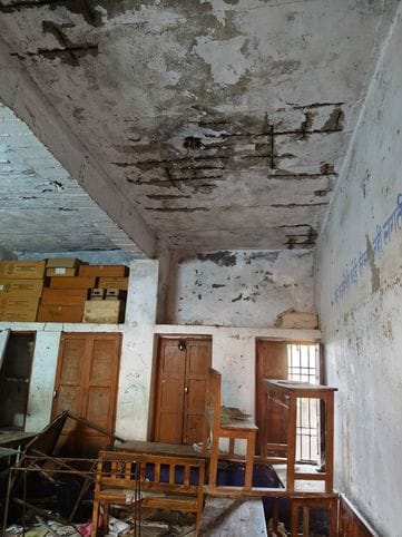 Plaster falling off the walls and ceilings of the school that received the cleanliness award