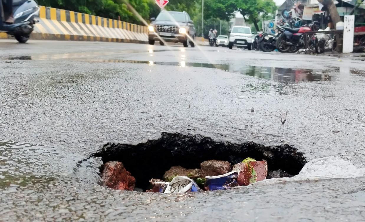 It rained heavily throughout the day... the truth was out, potholes started peeking out