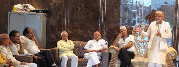 There was a discussion about the construction of Dharamshala in the meeting