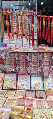 Shop decorated with Rudraksha, peacock feather and silver rakhis