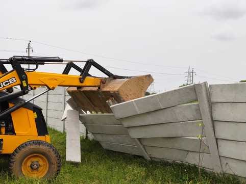 Bulldozer runs on construction in illegal colony