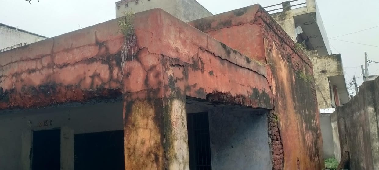Students forced to study sitting on broken floors in dilapidated rooms