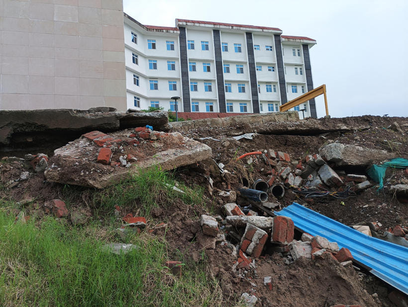 Hill gap adjacent to the medical college under construction, building in danger