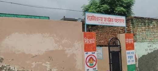 There is only one room in the name of school, 68 children are writing their future sitting under a tree