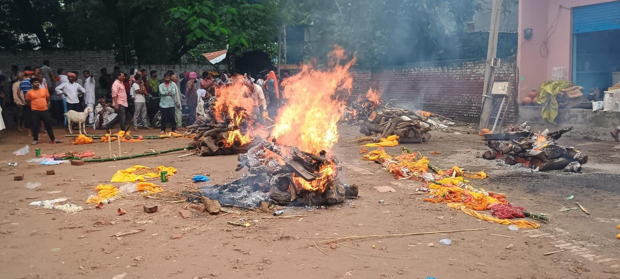 The pyres are burning at a distance of six hundred meters from the designated place at the cremation ground