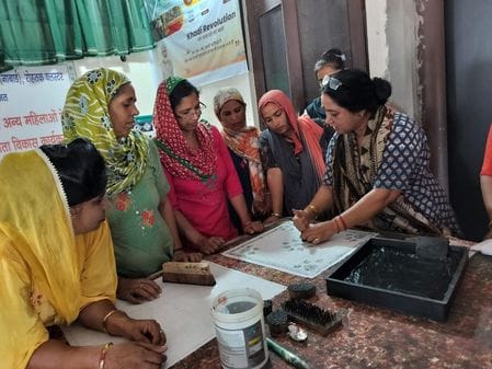 Women of 12 villages are adding colour to their dreams by doing sewing and printing