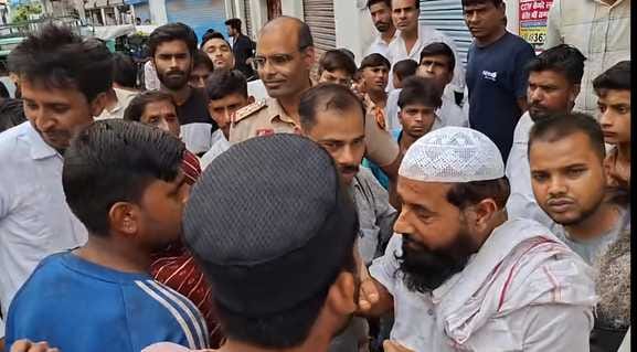 Gurugram police arrived to conduct raid, people protested