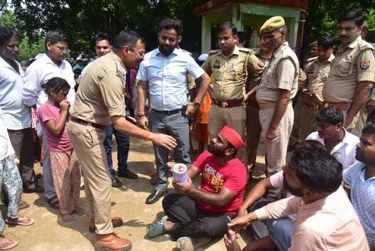 When the administration stopped the SP leader who had come to distribute relief material, he sat on a dharna