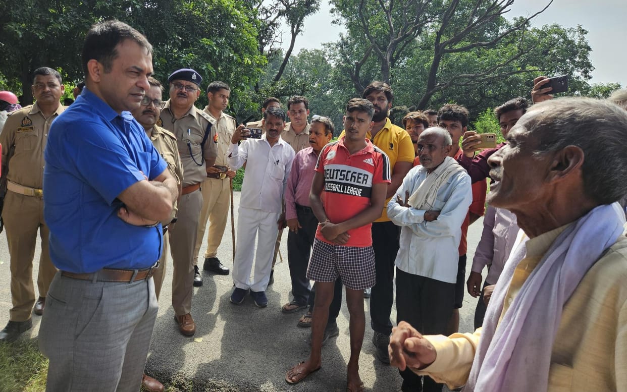 Two hundred villagers protest against the boards and cameras installed on the shrine