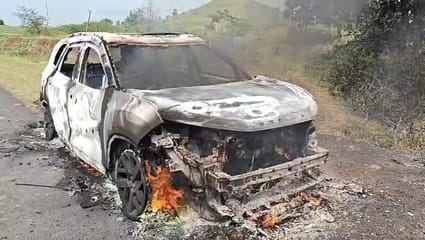 Breaks fail driver hits wall car erupts into a ball of fire