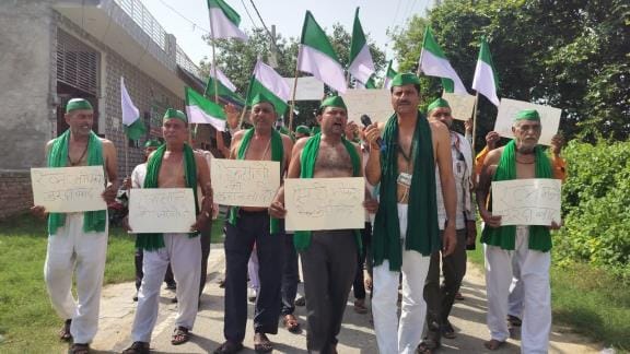 Farmers went semi naked and demanded compensation