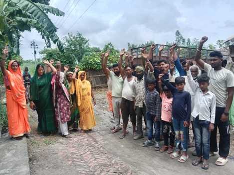 Protested against Pradhan for road