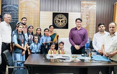 The girl students celebrated Rakshabandhan by tying a Rakhi to the SDM