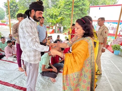 Raksha Sutra tied on the wrists of officers and prisoners in the district jail