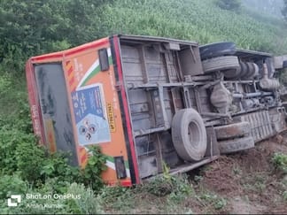 A bus of Rupediha depot loaded with passengers overturned in a deep ditch