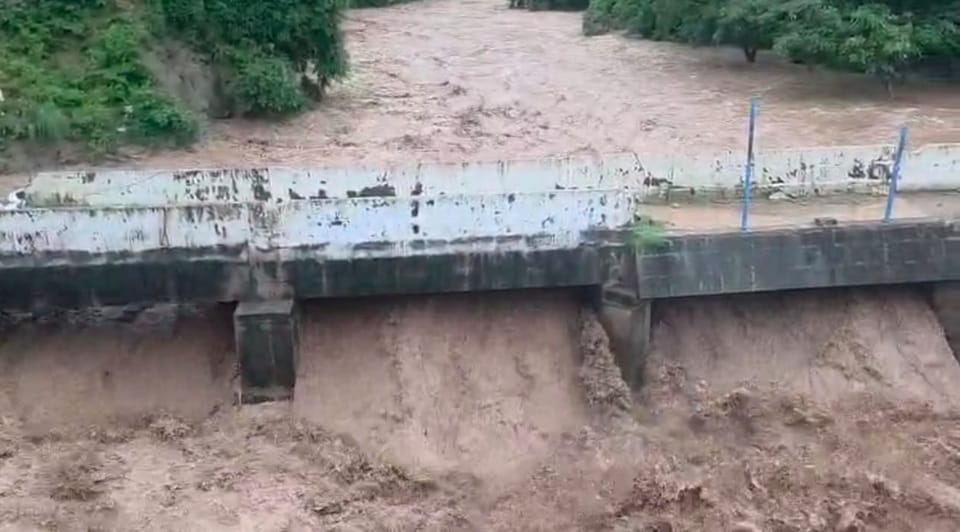 Due to the rise in water level in Som, water reached above the old bridge in Adibadri