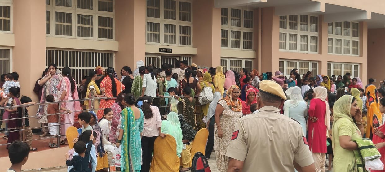 A confluence of brother-sister love in the district jail, prisoners' wrists decorated with Rakhi