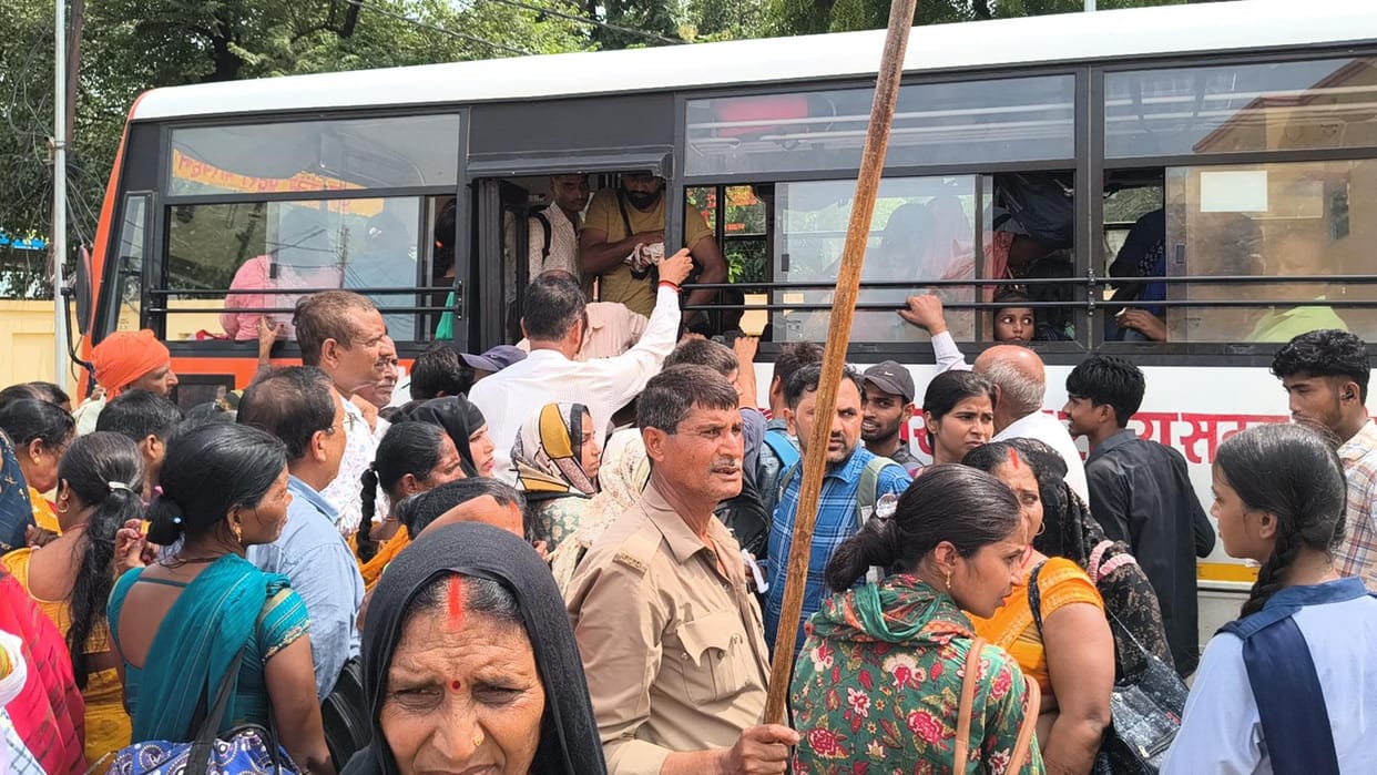 Crowds gathered in buses and trains, jostling for seats.