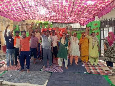 Cleaning employees of Atali Nagar Palika staged a sit-in protest regarding their demands