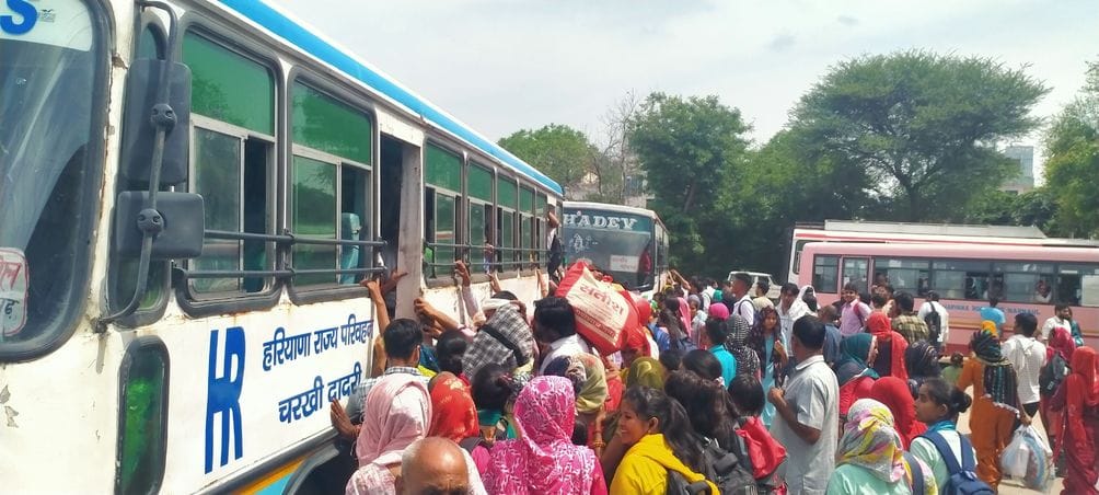 Crowds of sisters gathered, claims of arrangements failed, jostling to get into buses