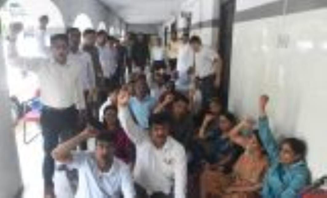 College teachers staged a sit-in protest