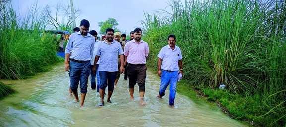 ADM went out to see the flood affected area on a tractor