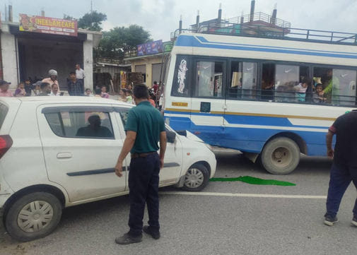 Car collides with a parked bus in Naulakha, four injured