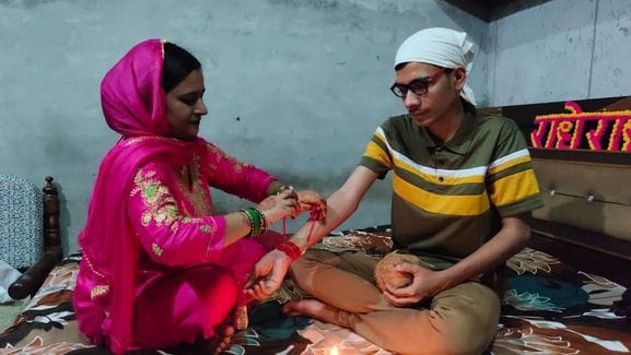 Sisters tied love on the wrists of their brothers