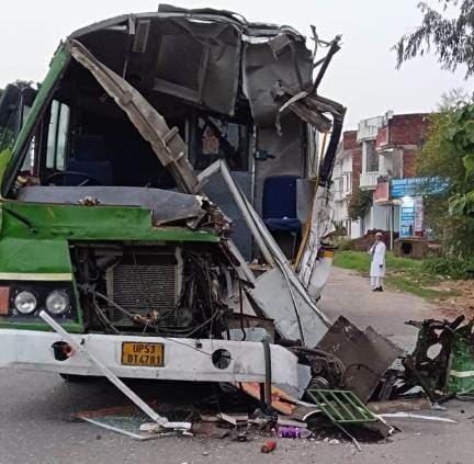 The bus collided with a parked truck, two people including the conductor were injured