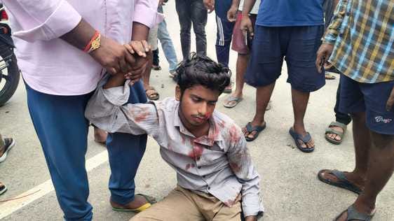 Grandmother and grandson riding a bike injured after being hit by a speeding car with BJP written on it