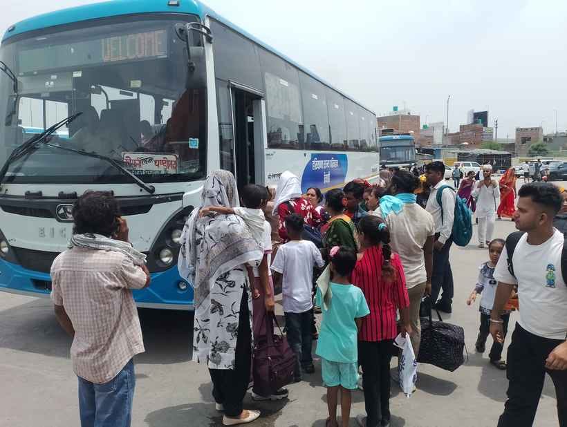 No seats were available in the buses, so had to travel standing