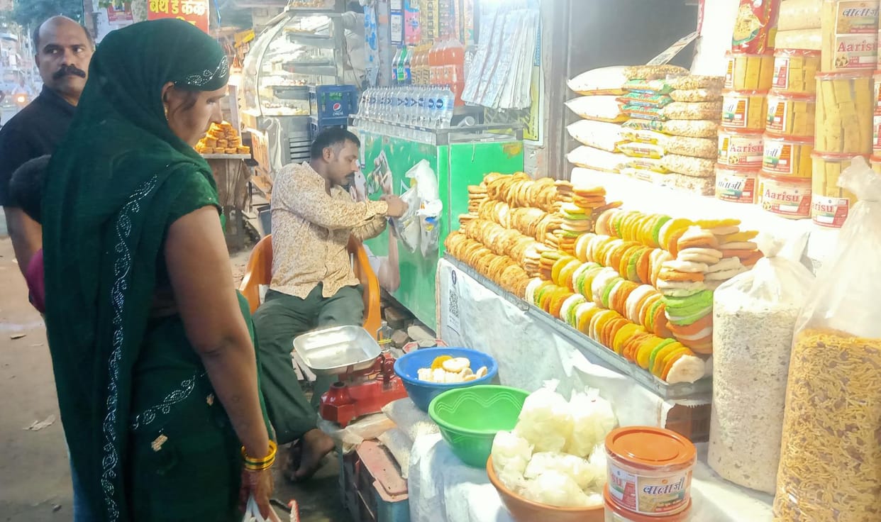 Jagran festival today, shops decorated with jalebi and anarsa