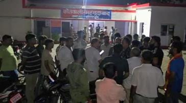 Activists angry over beating of colleague, surround police station