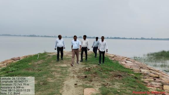 Officers inspect the embankment of Sarayu