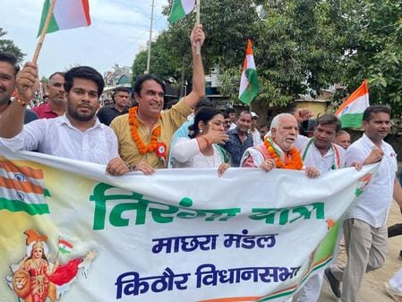Workers came out on bikes carrying the tricolor