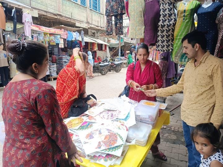 Items for decorating Laddu Gopal are being sold