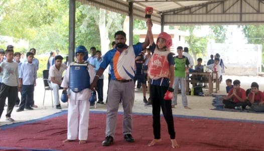 Ashwini won the gold medal in the 30 kg weight category of Karate competition