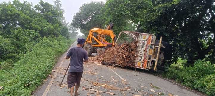 DCM overturned, driver injured after being trapped underneath