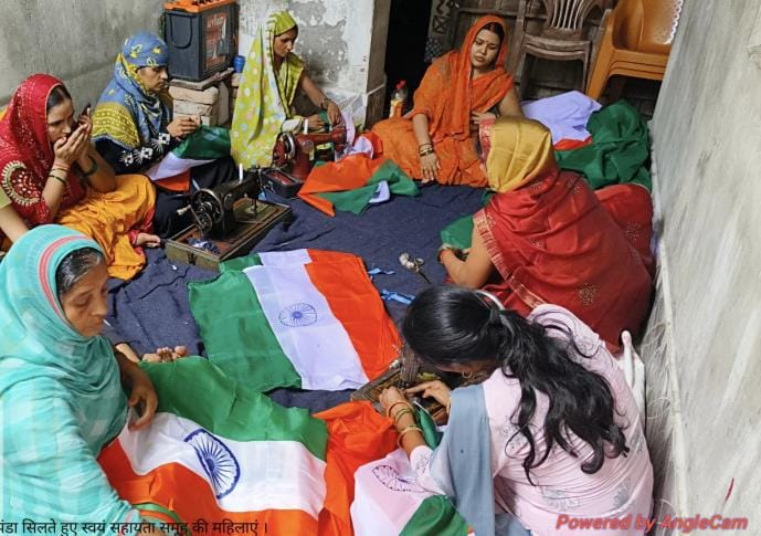 Women of the group are making the tricolor to awaken the spirit of patriotism